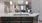 a kitchen island with a marble countertop and a sink
